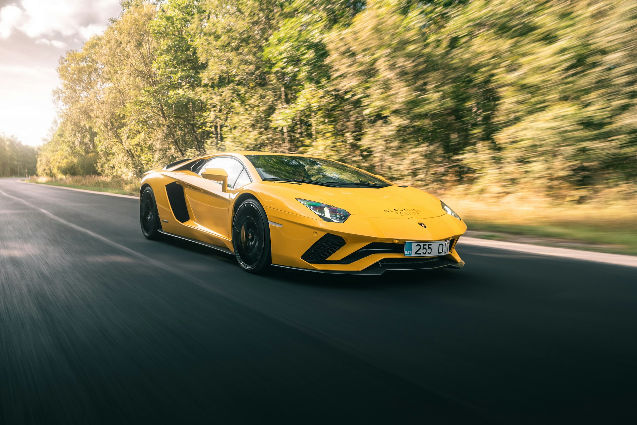 A yellow Lamborghini Aventador S, illustrating a private motoring collection