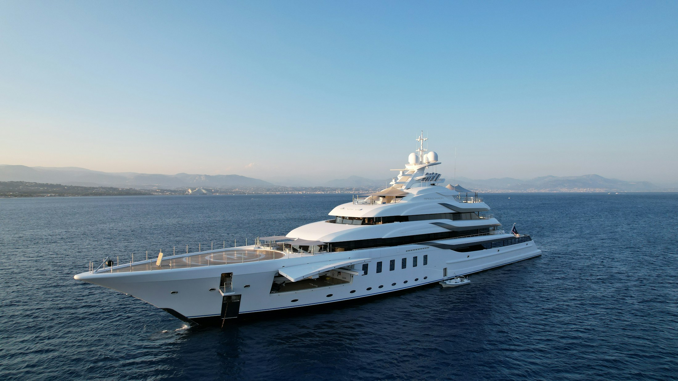 A 95-metre superyacht at sea, illustrating an exceptional private collection